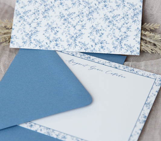 Blue watercolor floral notecard with your name personalized on the front and sky blue envelopes.