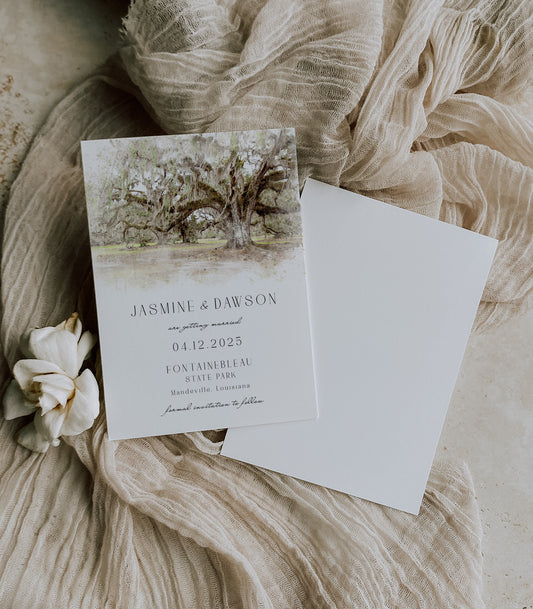 Louisiana state park wedding save the date with a watercolor image of a Southern Live Oak tree found in Fontainebleau State Park in Mandeville, Louisiana. Personalized wedding details are in a black whimsical font.