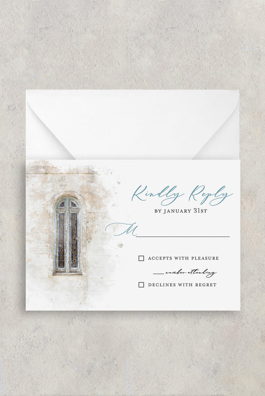 Wedding RSVP card with a watercolor image of an old stained glass window with your wedding details written in a turquoise and grey script/serif combo.