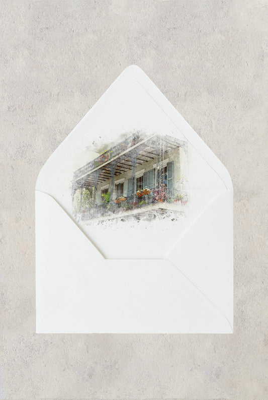 New Orleans wedding envelope liner featuring a watercolor image of a grey wrought iron balcony found in the French Quarter.