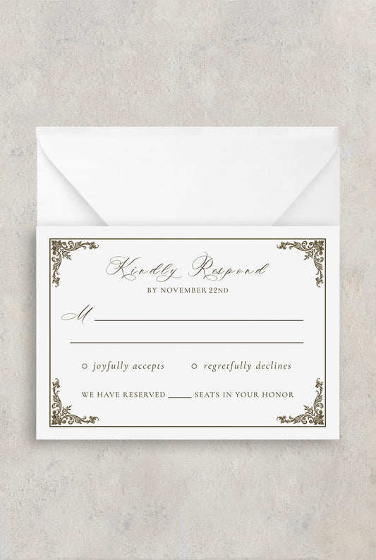 White with gold fleur de lis wedding RSVP card with your personal wedding details written in a gold script font.