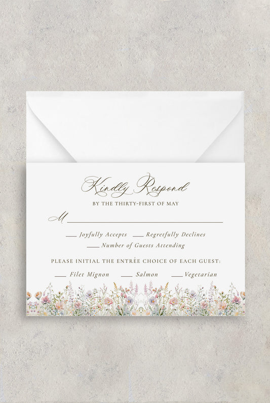 Spring floral wedding RSVP card with wedding details and watercolor flowers along the bottom.