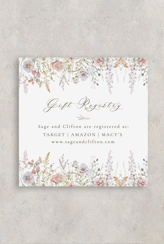 White and Spring floral wedding details card for the wedding couples wedding gift registry listed and their wedding website.