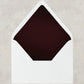 Dark and moody maroon wedding envelope liner.