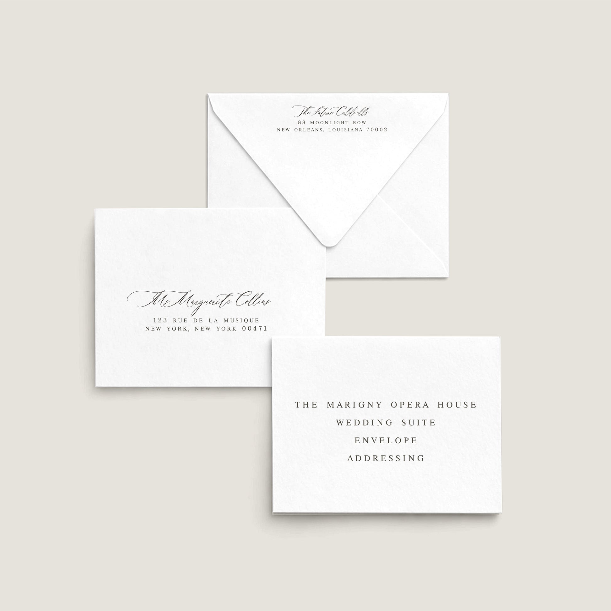 A white envelope with script and serif fonts for custom envelope address printing from A Touch of Nola.